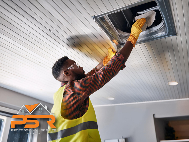 male technician profession air duct cleaning small ceiling air vent inside of residential home improving indoor air quality